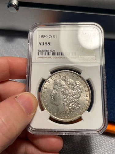 (#101551) Morgan Dollar: 1889 O --- NGC AU 58 ---   key date  (see video)