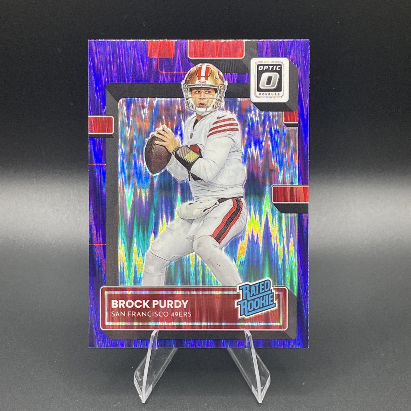 Brock Purdy Panini Donruss Optic #277 Purple Shock