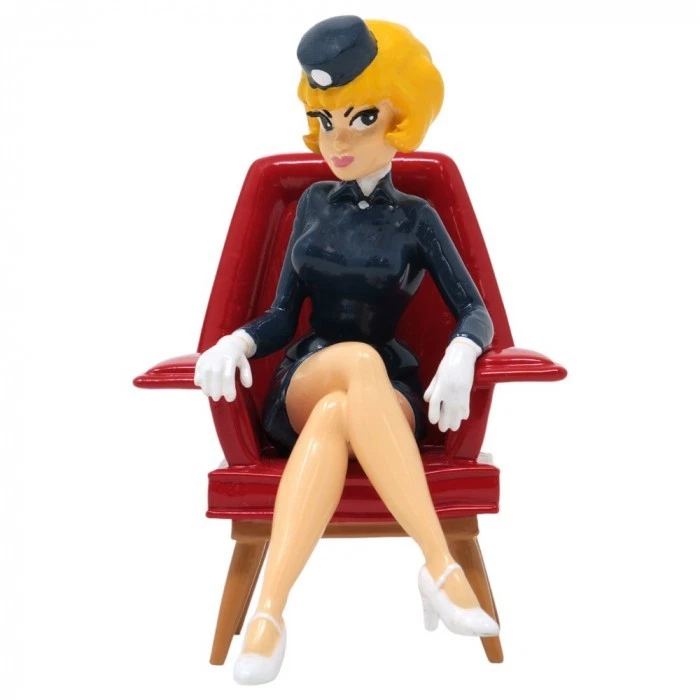 Natacha l'hôtesse de l'air assise dans fauteuil rouge figurine pixi ref 6372 - Photo 1/4