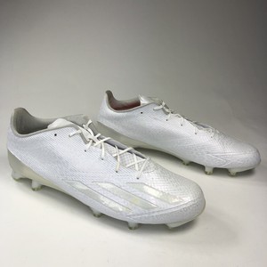 all white low top cleats