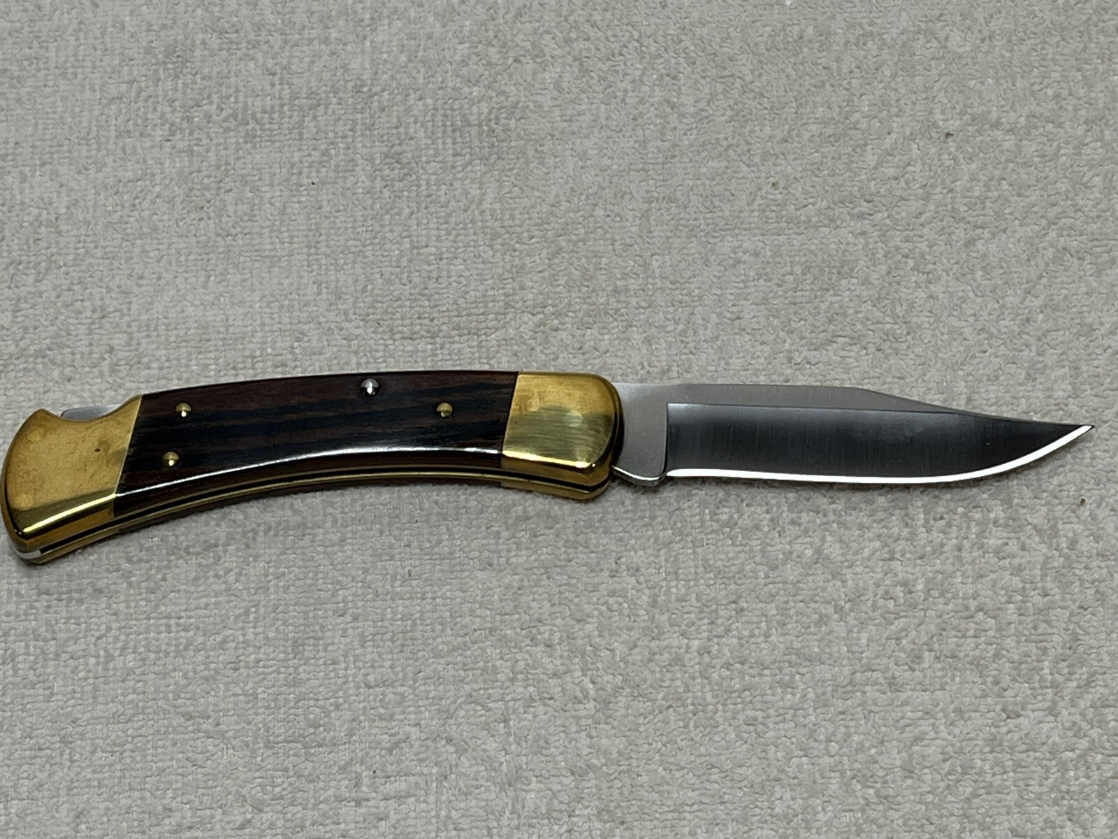 Buck 110 Folding Hunter Knife 50th Anniversary Edition Diamond Wood