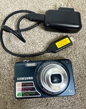 Samsung ST65 Compact 14.2 MP Point Shoot 5X Zoom HD Movie Digital Camera Works