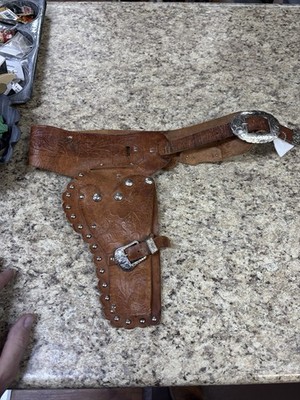 Vintage Hubley Cap G Leather Hand Tooled Holster.