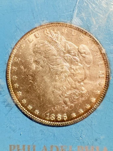 1886 $1 Morgan Silver Dollar, old US silver coin BU
