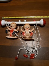 Vintage Baby Crib Mobile West Germany Rubber boy and girl on swings .