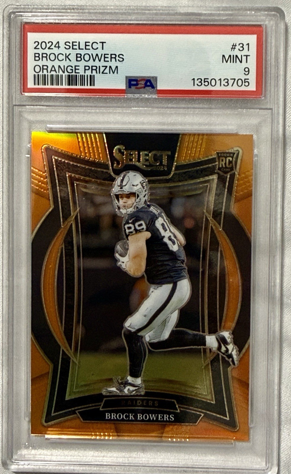 2024 Panini Select Brock Bowers #31 Orange Prizm /49 Rookie PSA 9 Raiders