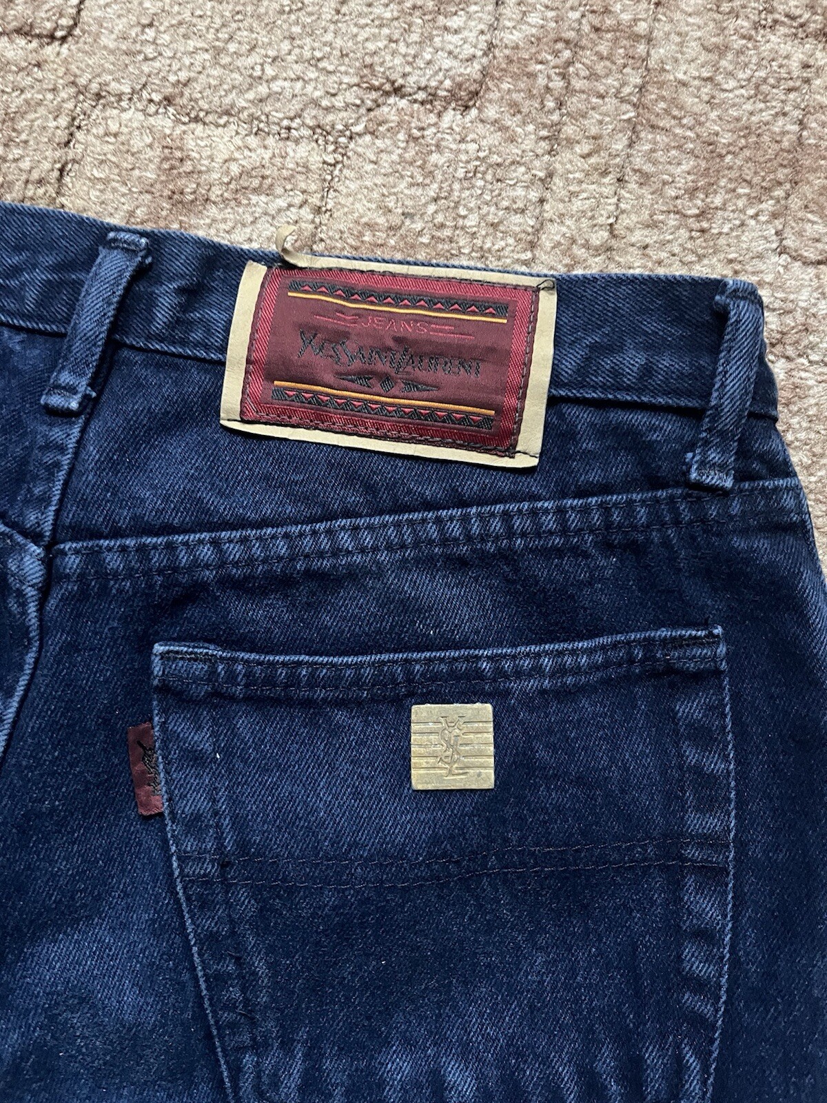 Jeans vintage Yves Saint Laurent YSL denim logo metallo anni 90 taglia 32