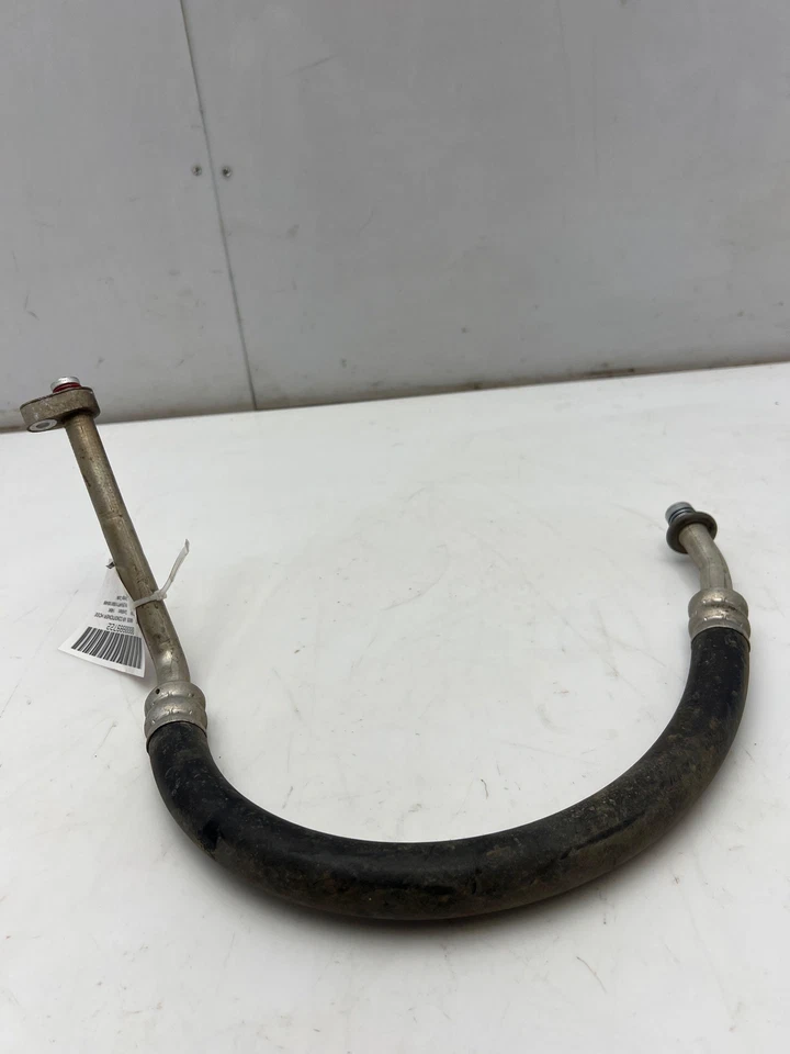 Manguera de succión de aire acondicionado Ford Crown Victoria 2006-2011 primera sección OEM 6W7Z19867AA Foto 2 de 4