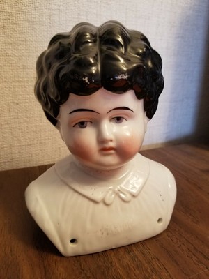 antique china doll heads