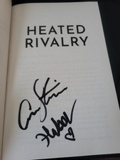 CONNOR STORRIE & HUDSON WILLIAMS DUAL SIGNED HEATED RIVALRY BOOK W/PROOF
