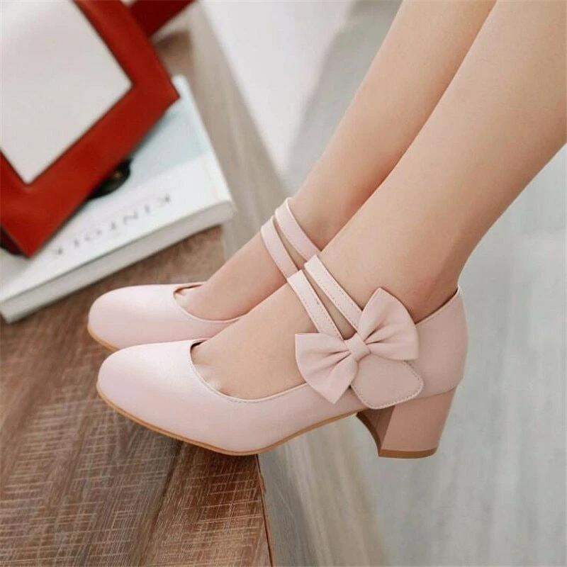 Premium Photo  Girl wears light pink dress. dark beige heel shoes