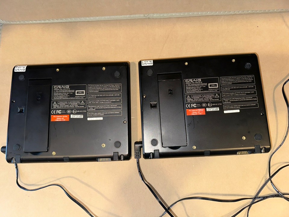 (2) Craig 7" Top Loading Portable DVD Players CDV510 (1) Remote (2