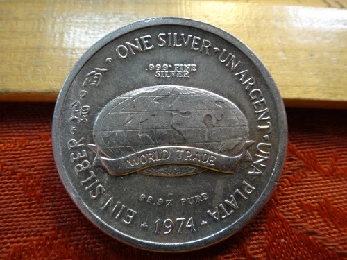 1974 International World Trade Silver Unit 1 Oz .999 Silver Bullion Round