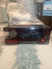 Bumblebee 1977 Chevrolet Chevy Camaro + Coin Transformers 1:24 JADA