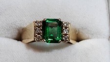 18ct gold modern synthetic emerald and Diamond Dress ring.