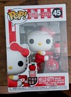 Funko Pop! Vinyl: Sanrio - Hello Kitty (Riding Bike with Noodle Cup) #45 — photo 1