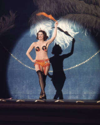 Sally Kirkland performs striptease in a scene from the 1973 film '- Old Photo