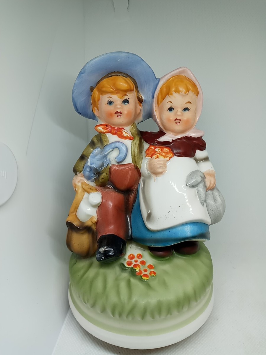 Vtg. Norleans LTD Porcelain Girl & Boy Music Box. Rotates &Plays