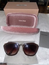 Miu Miu glitter feline eyes sunglasses with Goldmetal frame 