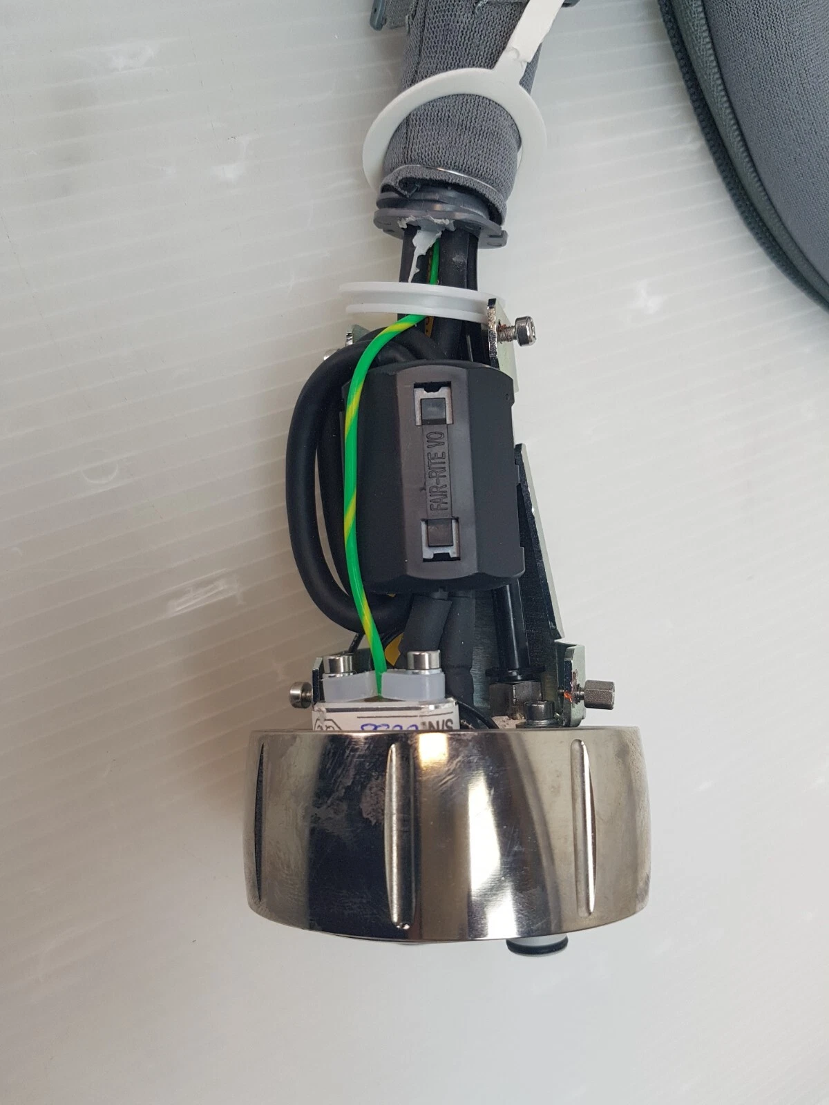 Inside the ResurFX connector: ferrite core and green-yellow ground wire