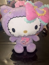 Mochila de felpa Sanrio Hello Kitty 2023 13 pulgadas caramelo mercancía BioWorld RN#115665