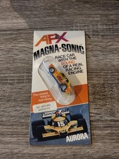 AFX BRE DATSUN 510 SLOT CAR BRAND NEW ON CARD YELLOW ORANGE