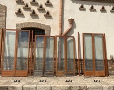 1 porta finestra in legno massello artigianale a due ante