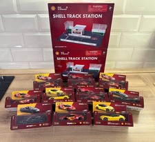 2026 NUOVO Burago Shell V-Power Track Station + Telecomando Bluetooth Auto 1:41
