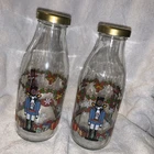 2 VTG Sherwood Nutcracker Cow Glass Liter Bottles W/ Covers France