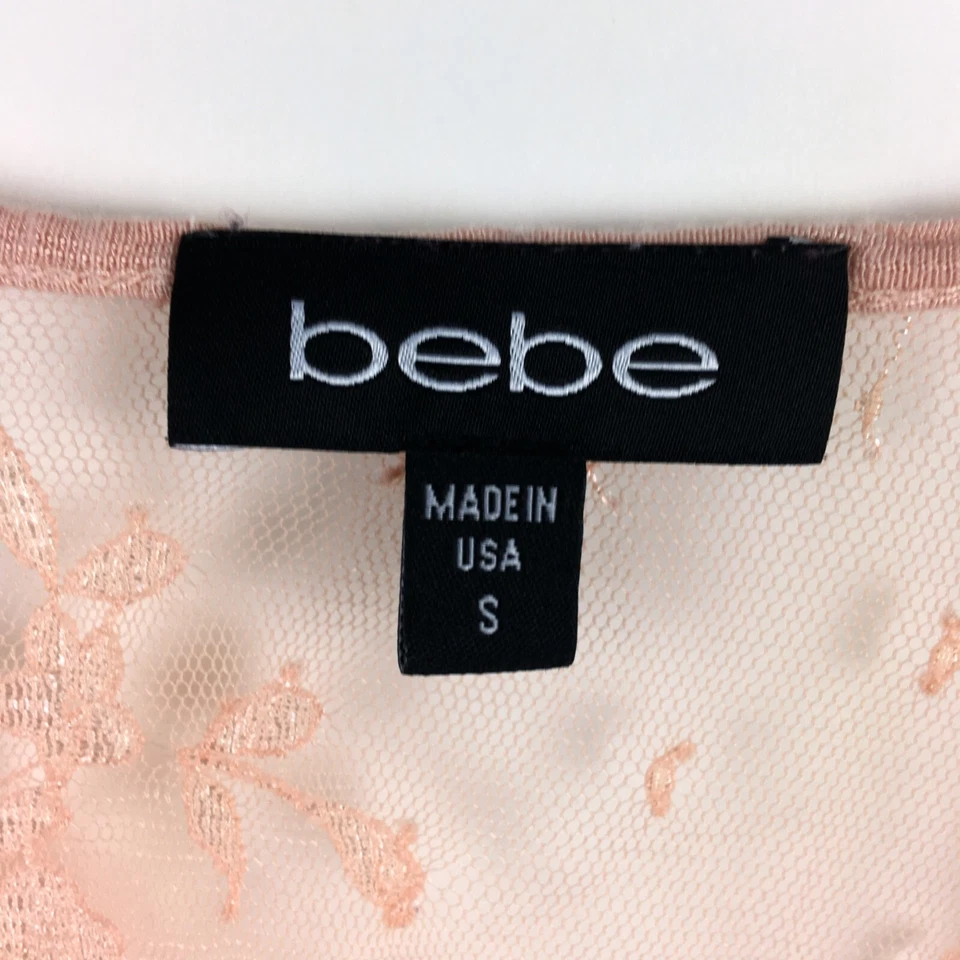 Camiseta sin mangas BEBE para mujer pequeña de encaje melocotón espalda cuello redondo fluido elástico Foto 3 de 4