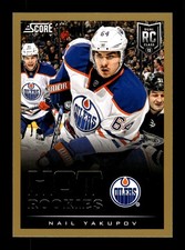 600. 2013-14 score . #650 Nail Yakupov . Hot Rookies RC Gold border . PWE (D)