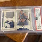 2018 Panini National Treasures Luka Doncic RC Dual Materials. PSA/DNA /25 PSA 10
