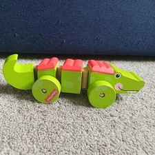 Fisher Price Krokodil auf Rädern Holzspielzeug Tier grün rot