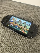 Sony PS Vita PCH-1000 Black 8GB Wi-Fi Handhel...