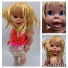 Vintage Blonde Mattel Baby Small Walk Doll 1967 with dress.
