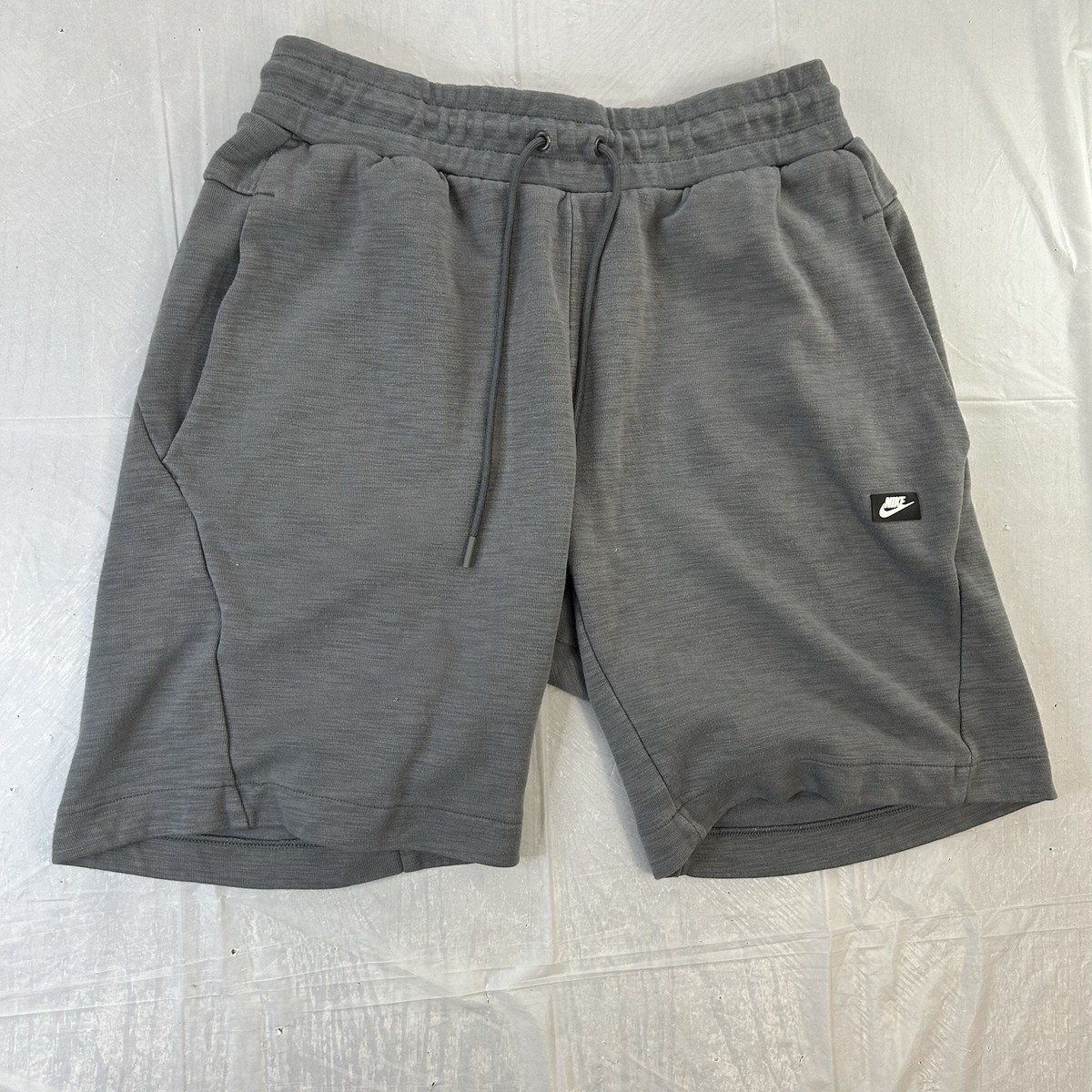 nike long sweat shorts