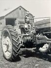 1930s Kid Boy Child Playing on John Deere Tractor Farm Machinery Photo