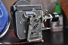 Bolex H8 Reflex camera body with a Switar 8-36mm H8RX lens