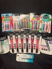 Assorted Chap Stick Products: lip balms, tinted lip oil, etc