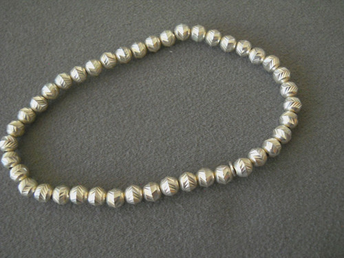 Italian Sterling Silver Chased Bead Strung on Nylon Stretch Bracelet