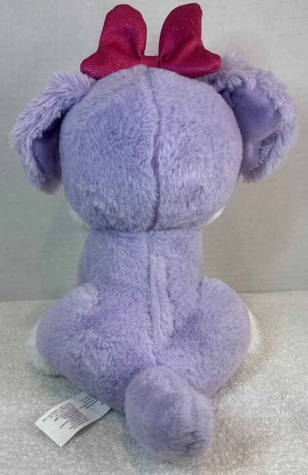 Juguete de peluche interactivo Disney Junior Minnie Mouse Creampuff mascota púrpura perro Foto 3 de 4