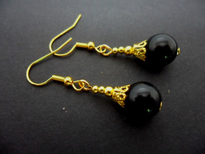 Authentic A PAIR OF BLACK ONYX GOLD PLATED DROP DANGLY EARRINGS. .