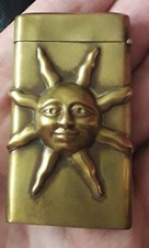 BRASS HAPPY SMILING SUN FACE VESTA MATCH STRIKE