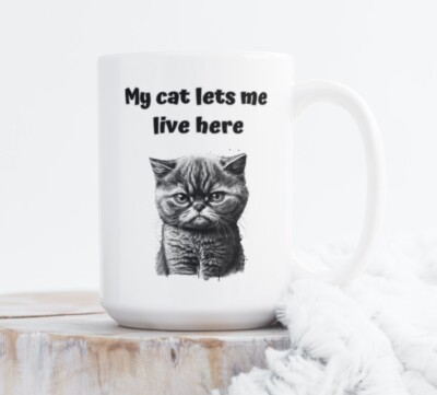 My Cat Lets Me Live Here Coffee Tea Mug Cup 15 Oz Ceramic White by Mugzan