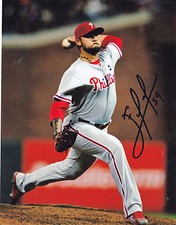 ELVIS ARAUJO    PHILADEPHIA PHILLIES   ACTION SIGNED 8x10