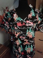 Rudolph the red nosed reindeer scrubs shirt size XL. Excellent