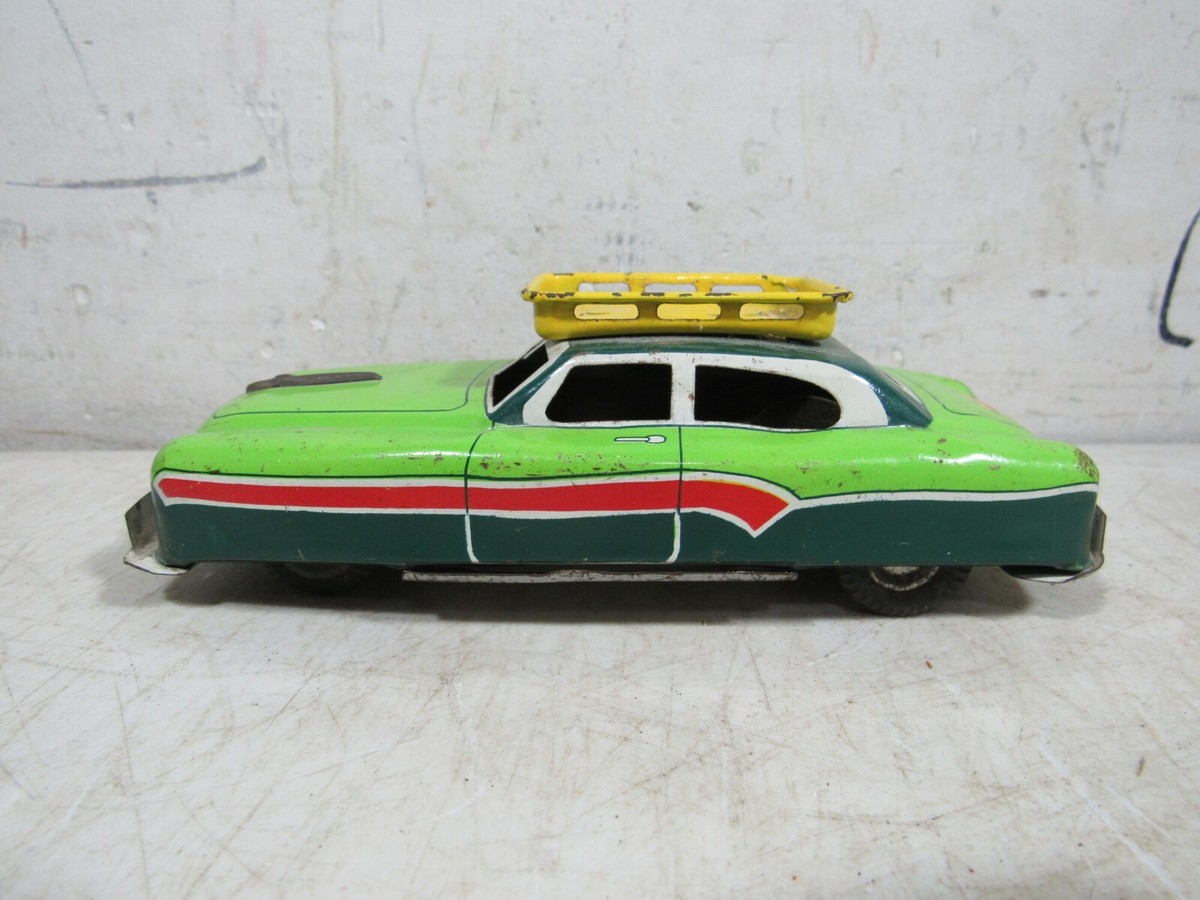 Vintage 1950s/60s 1958 Tin Friction Toy Sedan Car W/Roof Rack