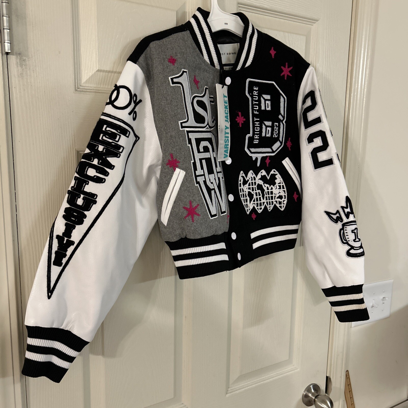 Giacca prima fila ecopelle manica toppe ricamate Varsity taglia media