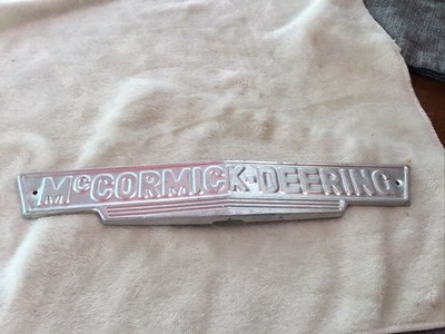 Vintage Aluminum Front  Embossed Emblem McCORMICK DEERING Tractor - 12  x 2 