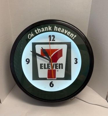 NEW 7-Eleven Clock 7 eleven store clock  Oh thank heaven! Works great!